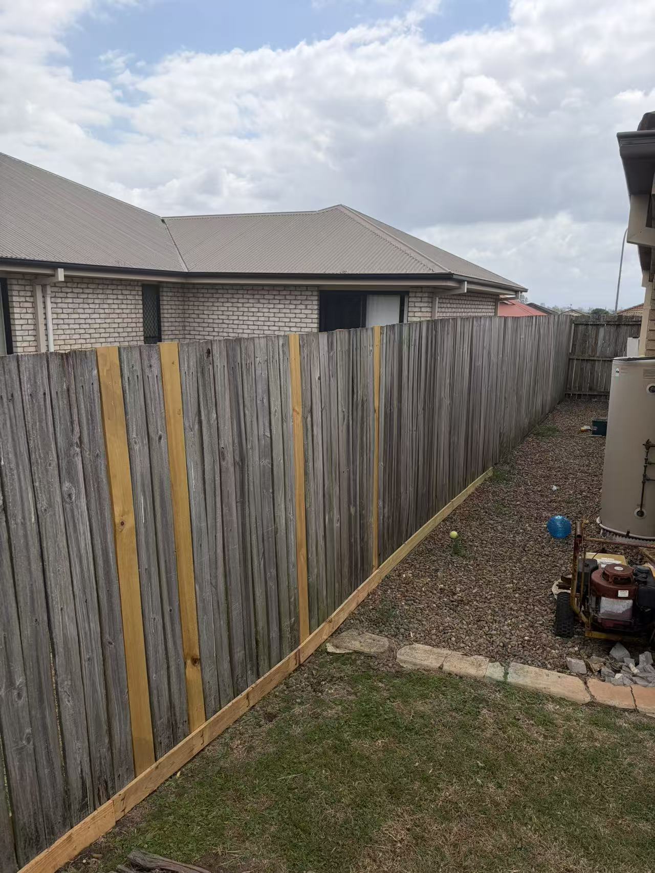 Timber fence boards and support timber from a supplied work photo